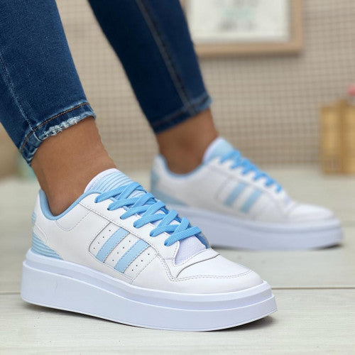 Tenis blanco con azul para mujer Forum